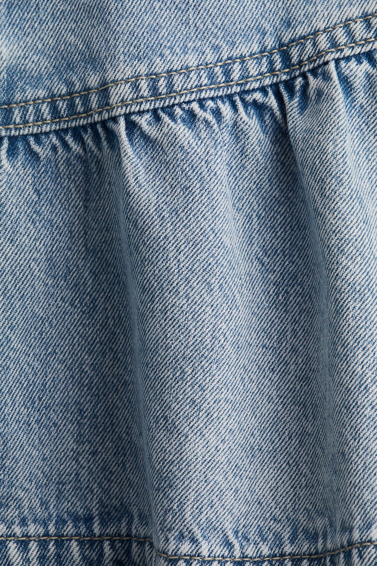 FALDA DENIM CON PEPLUM