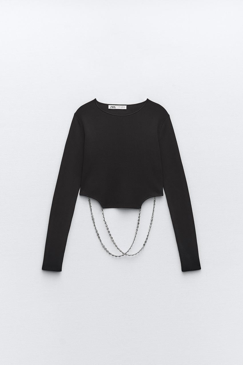 Blusa manga larga con escote en la espalda
