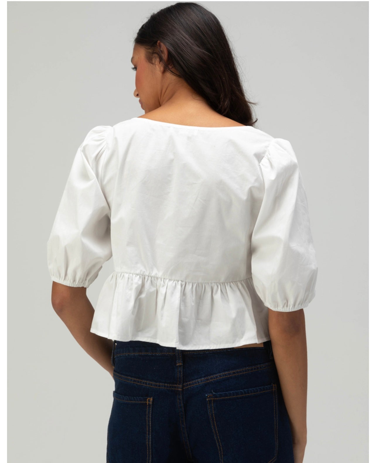 Top cuello redondo triple lazo