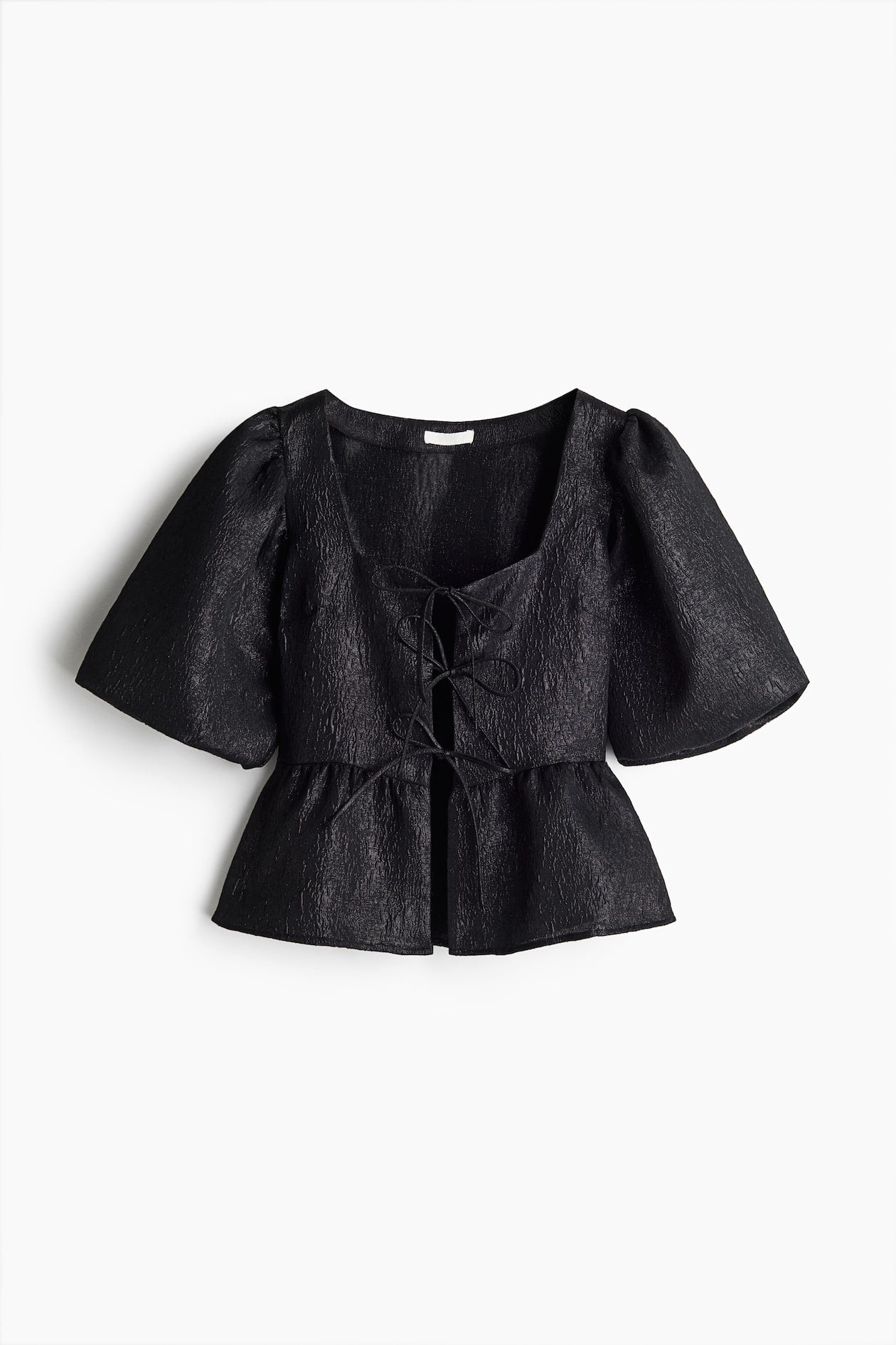 Blusa pomposa metalizada