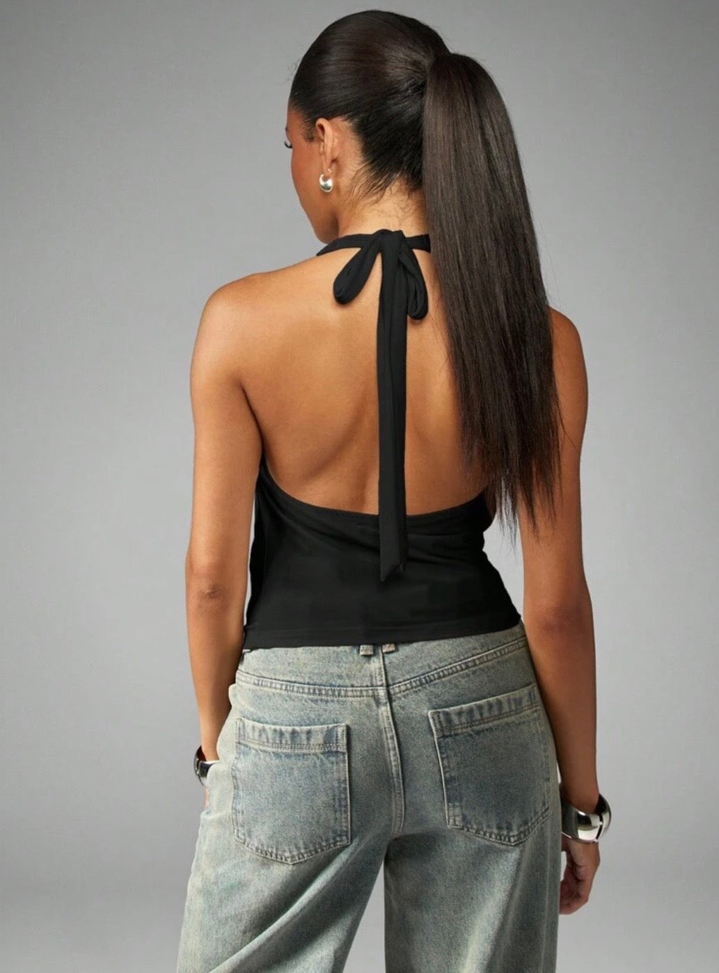 Top cropped con tiros