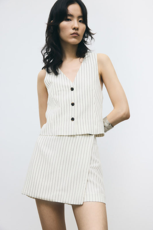 Short falda cruzada