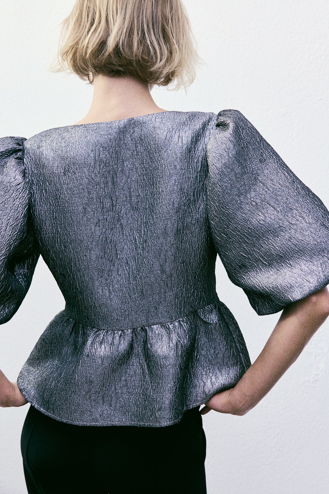 Blusa pomposa metalizada