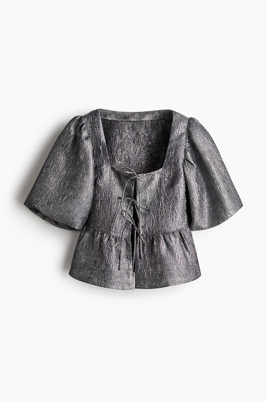 Blusa pomposa metalizada
