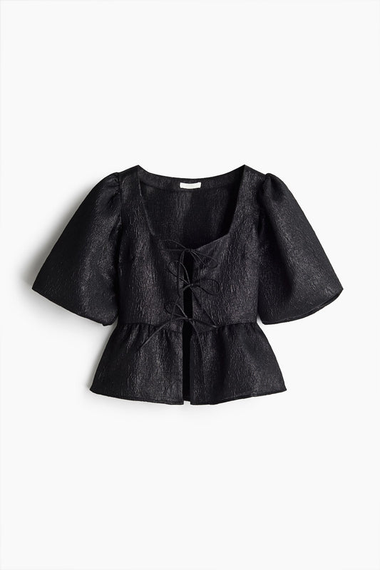 Blusa pomposa metalizada