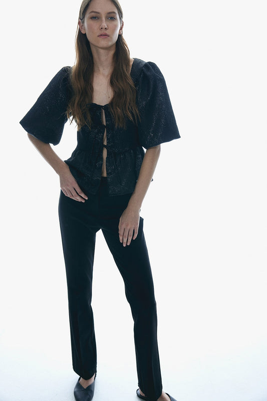 Blusa pomposa metalizada